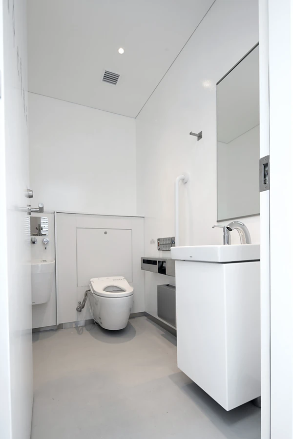 <p>Kashiwa Sato designed the five toilets to be unisex and fully accessible. Rather than choosing the toilet based on gender, each person should decide based on their needs and the corresponding fixtures in place. The stalls feature WASHLET (shower toilets), helpful folding seats and hygienic, sensor-based faucets. Photo: TOTO LTD.</p>