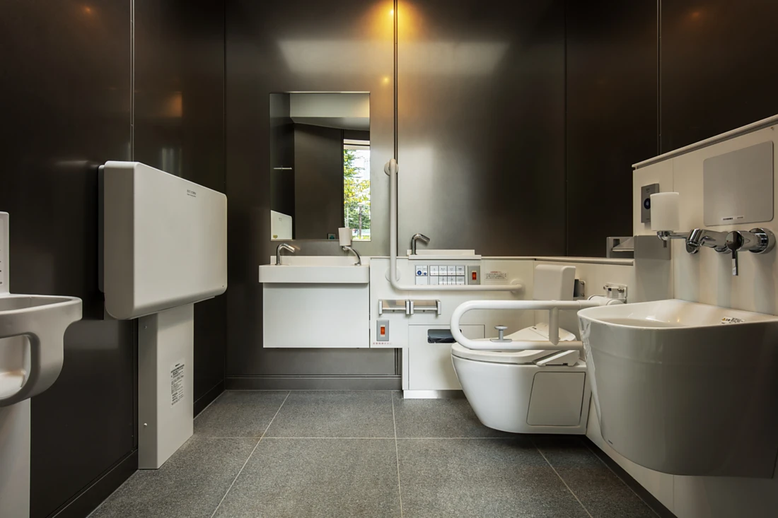 A view inside “everyone’s toilet”, designed by Tadao Ando, which also includes a baby seat and changing table, and a place to empty colostomy bags. Like all of the “Tokyo Toilets”, this space is shaped by the idea of Japanese hospitality, or Omotenashi culture. Photo: The Nippon Foundation